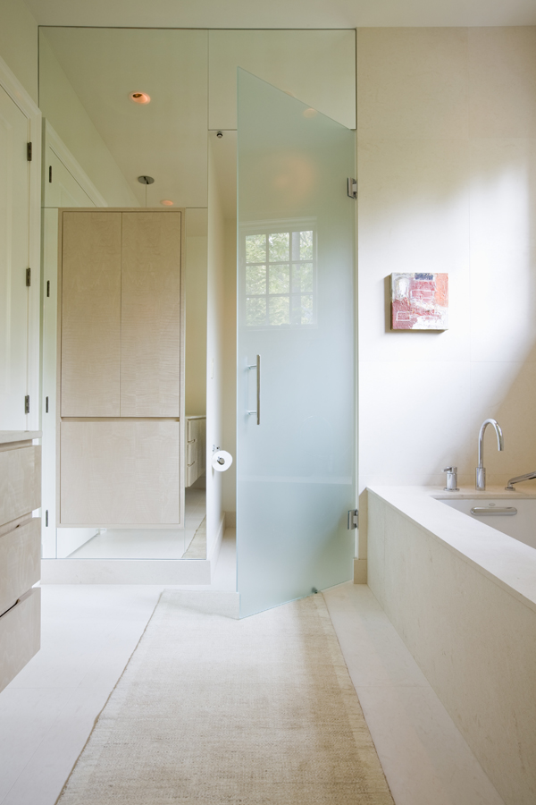 Contemporary bathroom by Washington, DC architects and interior designers, Studio Santalla features a glass enclosed watercloset and a floating vanity