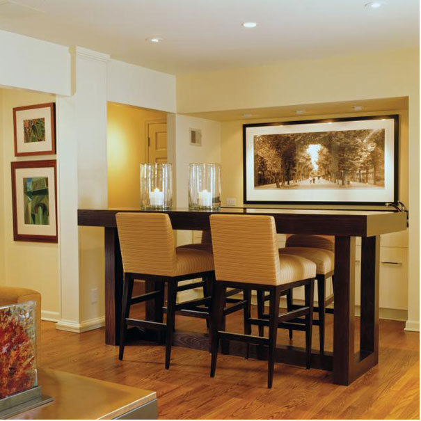 This bar-height breakfast table was custom designed for this colonial home by Georgetown firm Studio Santalla