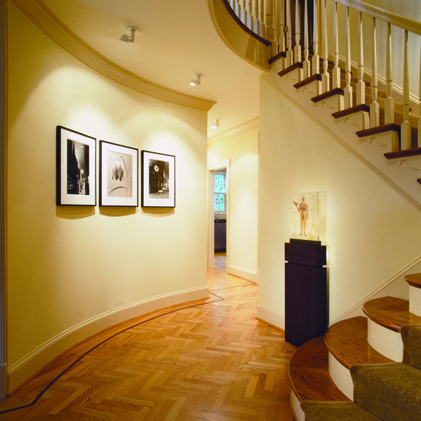 Contemporary foyer of Washington, DC colonial home by architect and interior design firm Studio Santalla