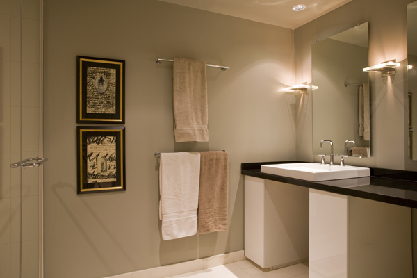 This Washington, DC basement remodel by Studio Santalla included a soft and elegant bathroom