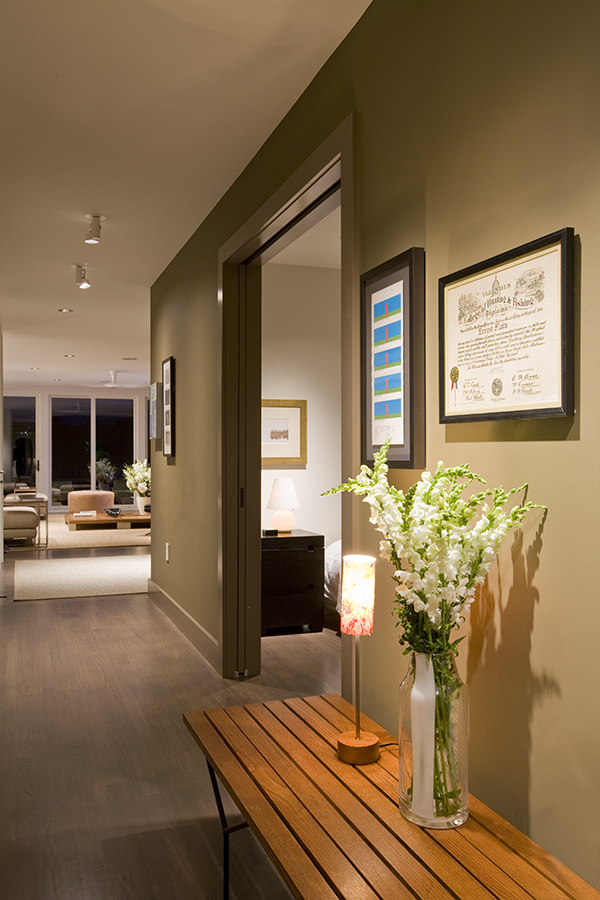 Hallway with clean and modern door trim on the Eastern Shore by Washington, DC Architecture and Interior Design firm Studio Santalla