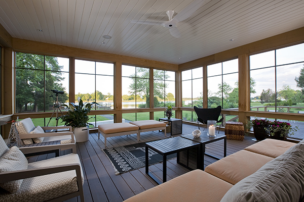 Screened deck with contemporary outdoor furnishings by Washington, DC Architecture and Interior Design firm Studio Santalla offers beautiful views of the Eastern Shore
