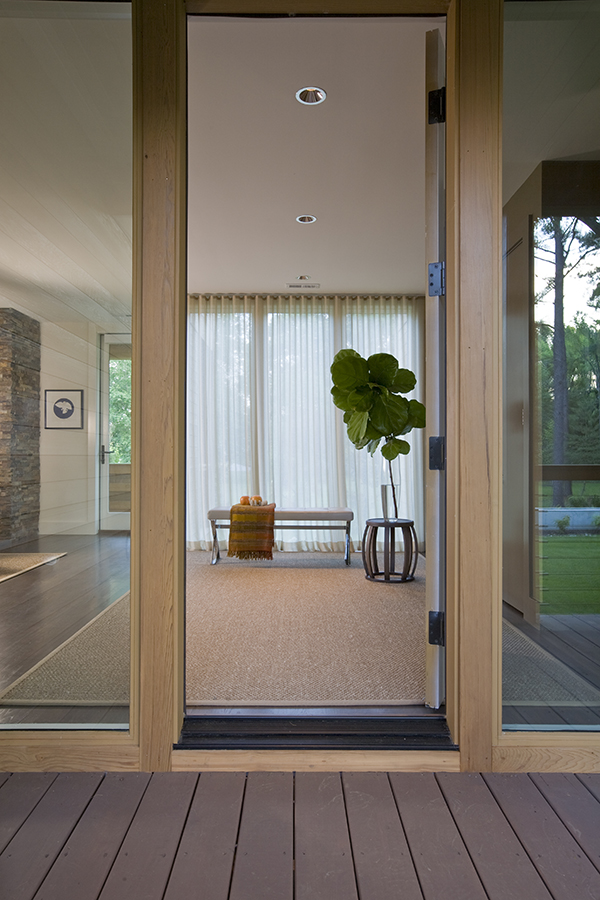 Simple and elegant entry with maxalto bench and fiddle leaf fig on the Eastern Shore by Washington, DC Architecture and Interior Design firm Studio Santalla