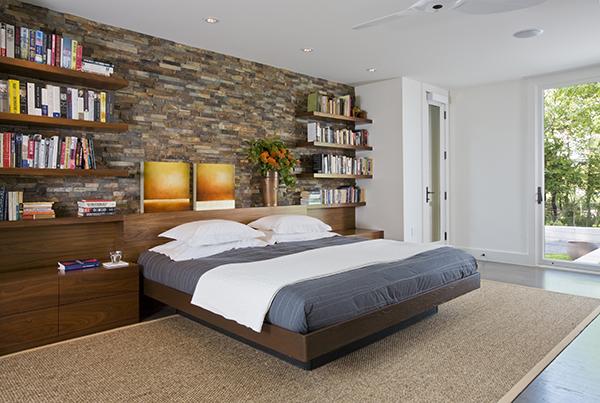 Luxurious bedroom with custom designed headboard on the Eastern Shore by Washington, DC Architecture and Interior Design firm Studio Santalla