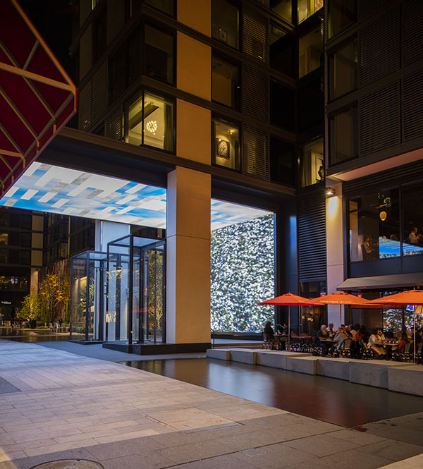 Courtyard View of the apartment provides a peak at the client's contemporary art collection. The space is directly above the LED gateway.