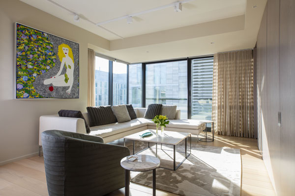 Color, texture and soft upholstery add warmth and sophistication to the living area of this 800sf apartment in Washington, DC.