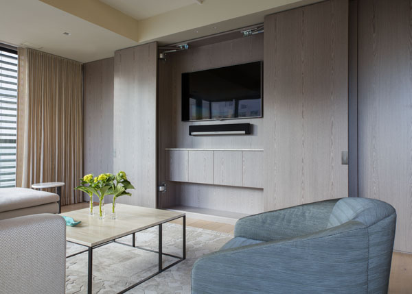 Elegant built-ins keep the media center clean and orderly.